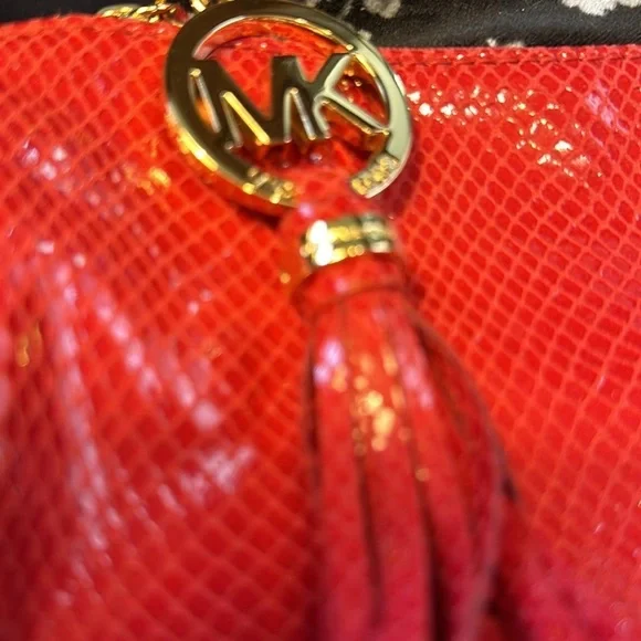 Michael Kors cosmetic bag or you could use it as a small purse. Beautiful red.‌ - Picture 6 of 6